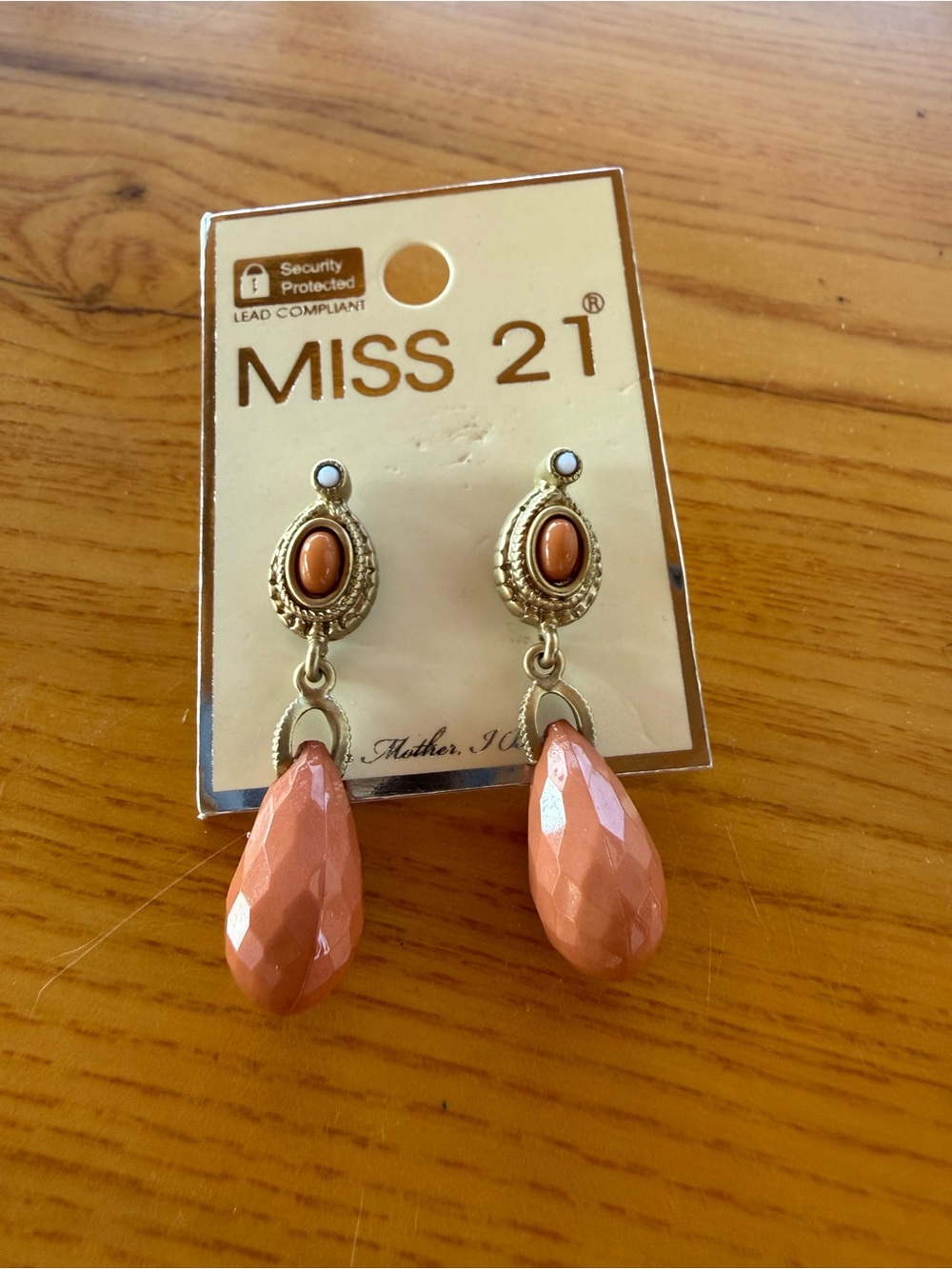 Gold-Tone Earrings with Peach Teardrop Drops